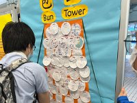 Putting their wishes on the Bun Tower